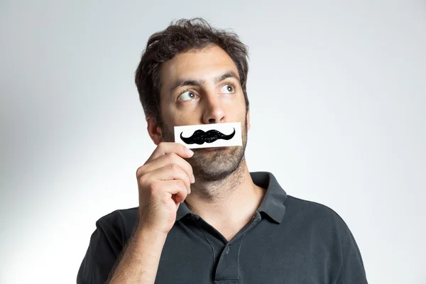 Funny guy with fake moustache — Stock Photo, Image