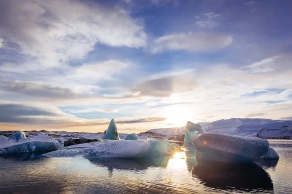 Izland, naplemente Jokulsarlon gleccser lagúna Stock Kép