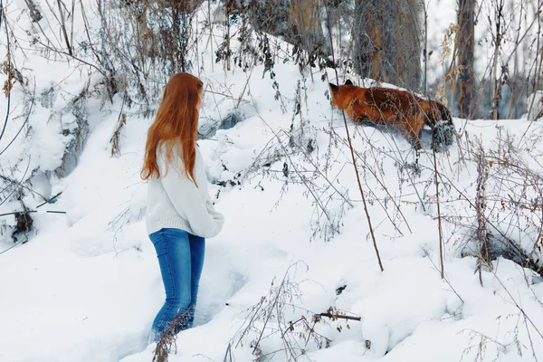 Beautiful girl with red fox on walk — Stock Photo, Image