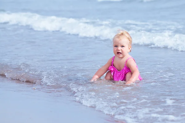 Little cute happy girl bathes in sea,  Italy, outdoor — Stock Photo, Image