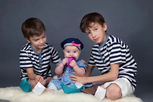 Portrait of happy brothers and cute small sister — Stock Photo, Image