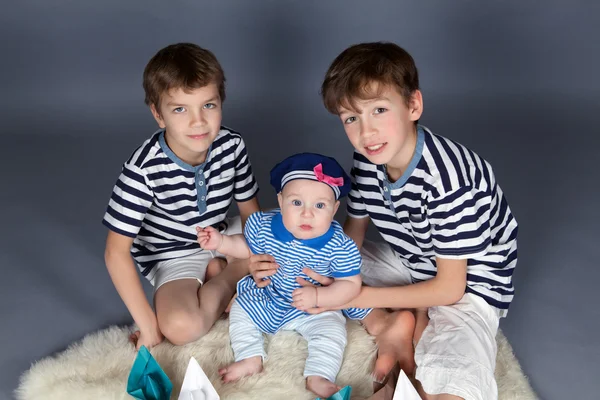 Portrait of happy brothers and cute small sister — Stock Photo, Image