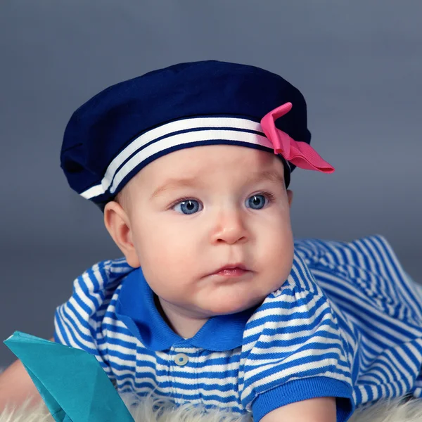 Portrait of happy cute baby girl in sailor dress — Stock Photo, Image