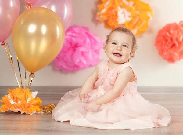 Cute baby girl celebrates birthday one year. — Stock Photo, Image