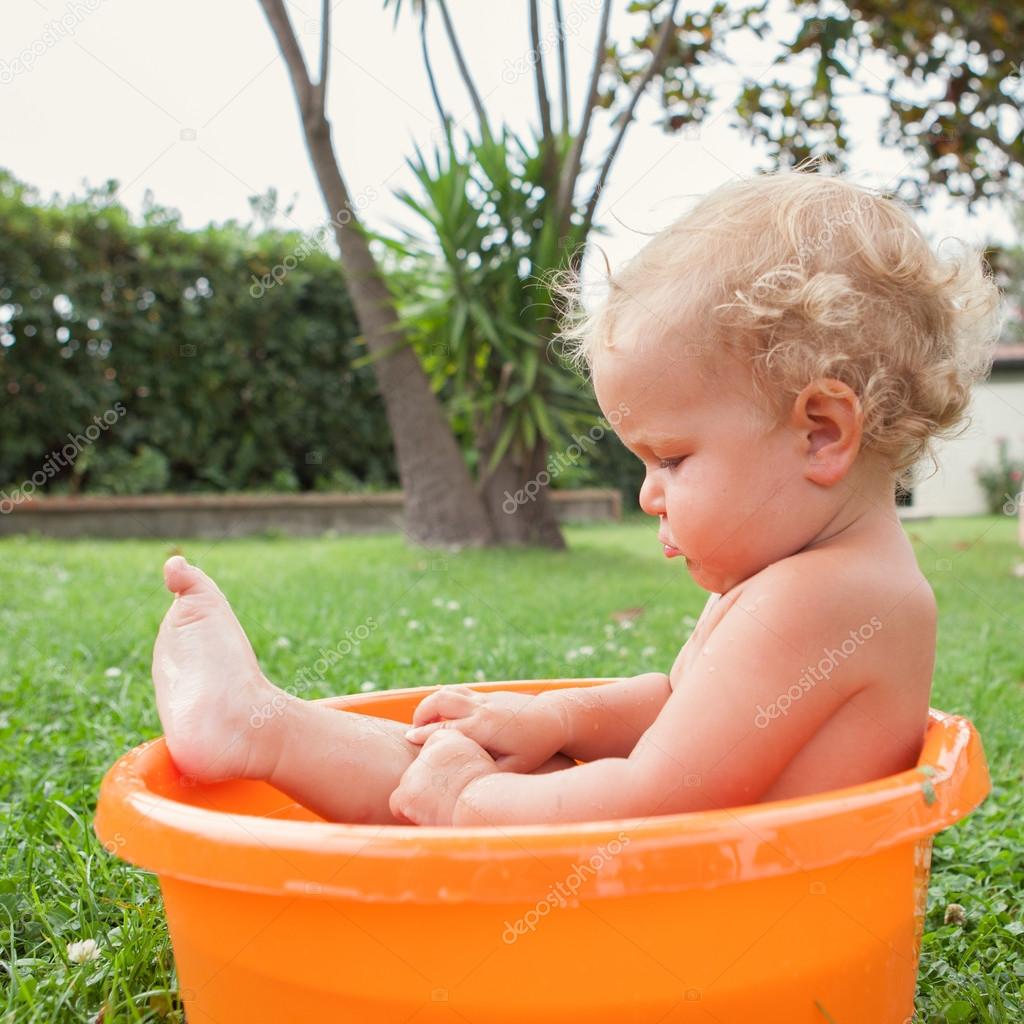 Cute Kid With Curly Hair Lying on the Bed · Free Stock Photo, image size:1024x1024