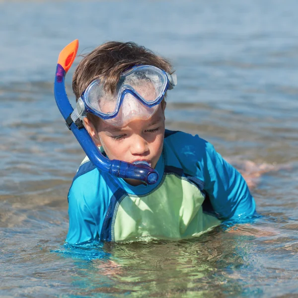 Portrait of happy cute boy wearing snorkeling mask — Stock Photo, Image