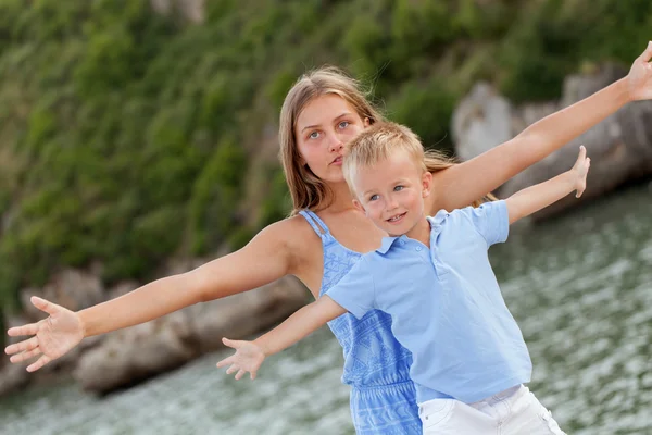 Portrait of happy cute big sister and little brother — Stock Image Portrait of happy cute big sister and little brother Royalty Free Stock Images