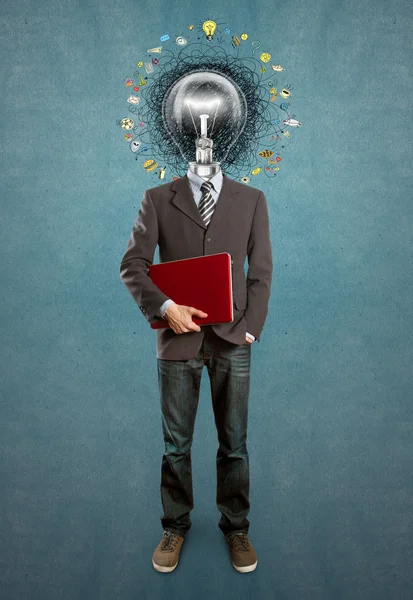 Lamp head businessman and symbols — Stock Photo, Image