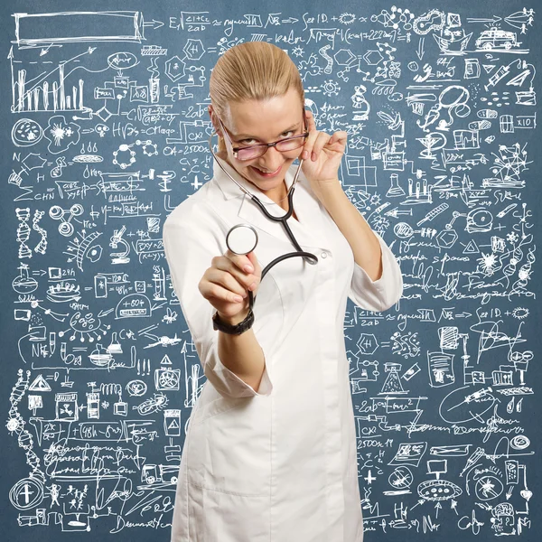 Young doctor woman with stethoscope — Stockfoto