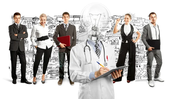 Business Team con lampada testa medico — Foto Stock