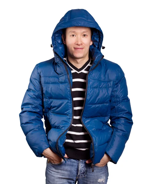 Asiatisk man i ner vadderad kappa — Stockfoto