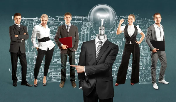 Lamp head businessman and business team — Stock Photo, Image