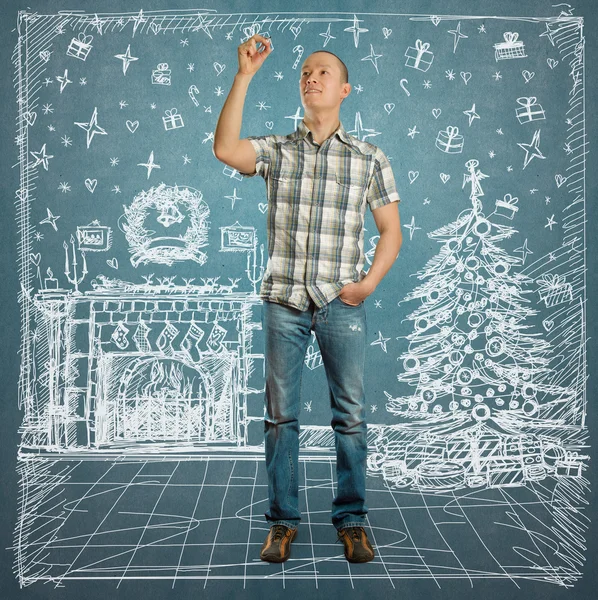 Man over Kerstmis items — Stockfoto