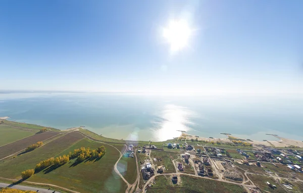 Aerial view of a summer house village at blue sea coast. — Stock Photo, Image