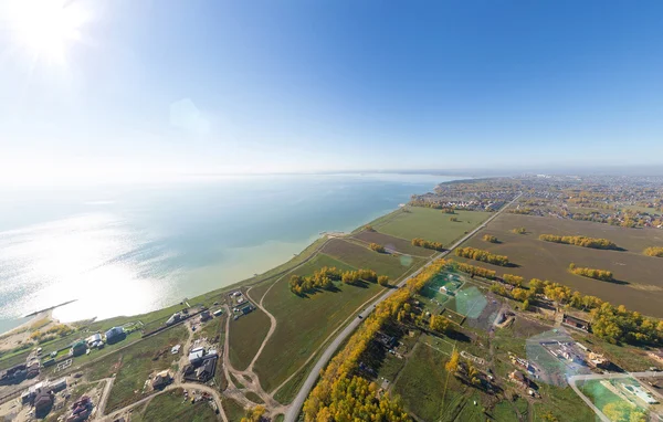 Aerial view of a summer house village at blue sea coast. — Stock Photo, Image