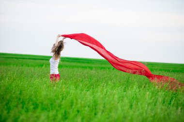 Genç Bayan runing doku yeşil alanı ile. Kadın eşarp ile.