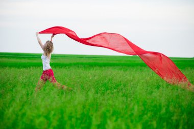 Genç Bayan runing doku yeşil alanı ile. Kadın eşarp ile.