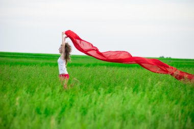 Genç Bayan runing doku yeşil alanı ile. Kadın eşarp ile.