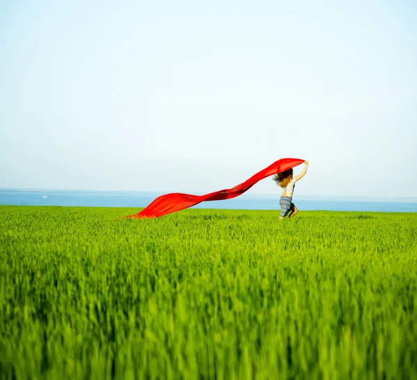 Young happy woman in wheat field with fabric. Summer lifestyle — Stock Photo, Image