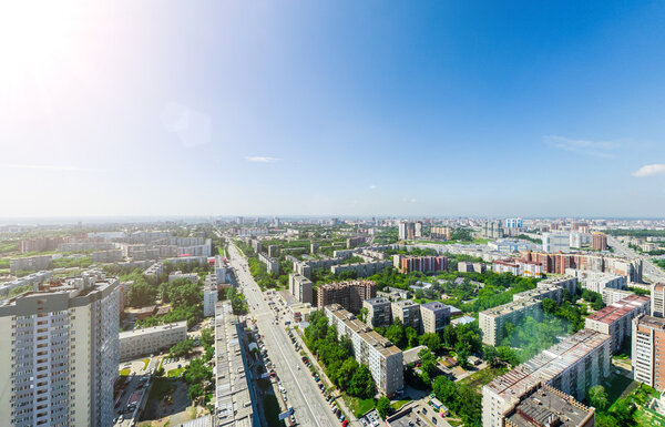 Aerial city view. Urban landscape. Copter shot. Panoramic image.