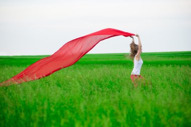 Genç Bayan runing doku yeşil alanı ile. Kadın eşarp ile.