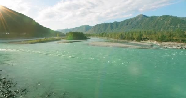 Low altitude flight over fresh fast mountain river with rocks at sunny summer morning. — Stock Video