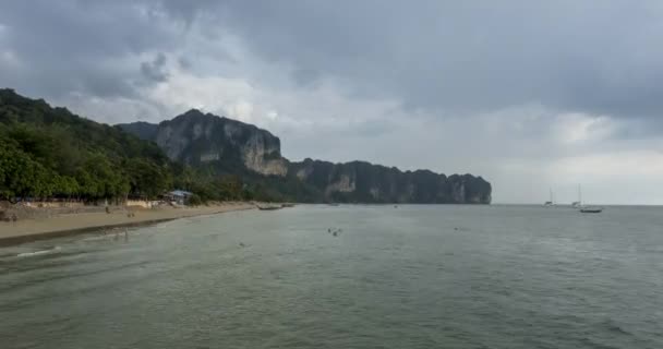 Time lapse of rain clouds over beach and sea landscape with boats. Tropical storm in ocean. — Stock Video