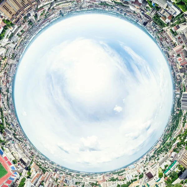 Aerial city view with crossroads and roads, houses, buildings, parks and parking lots. Sunny summer panoramic image — Stock Photo, Image