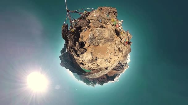 360 VR Gokyo Ri mountain top. Tibetan prayer Buddhist flag. Wild Himalayas high altitude nature and mount valley. Rocky slopes covered with ice. Tiny planet transformation. — Stock Video