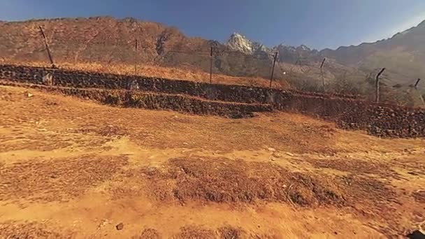 LUKLA, NEPAL - 1 DECEMBER 2017: Aircraft from Kathmandu arrives to airport. Wild Himalayas high altitude nature and mount valley. Rocky slopes covered with trees. — Stock Video