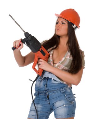 Elektrik çekiç matkap ile kadın.