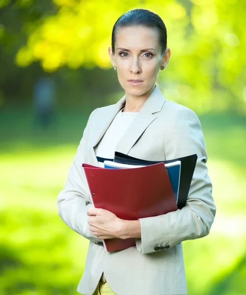 Business woman with paper folder — Stock Photo, Image