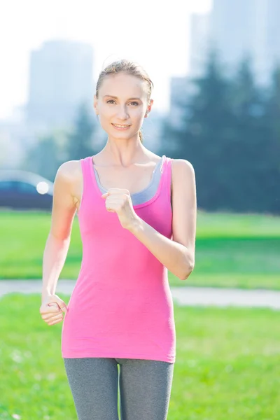 Jogging woman running in city park — Stock Photo, Image
