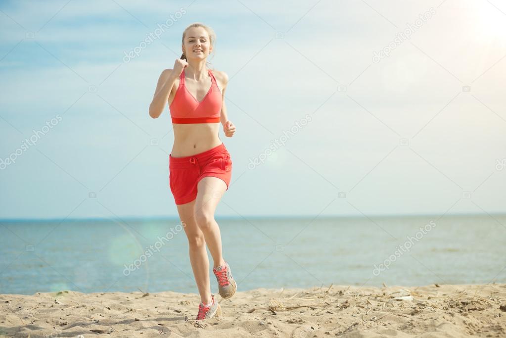 Lady running at the  beach