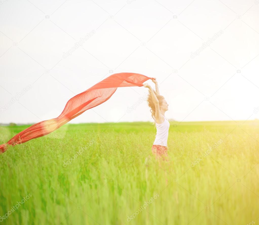 Lady runing with tissue in green field