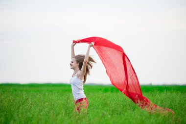 Genç Bayan runing doku yeşil alanı ile. Kadın eşarp ile.