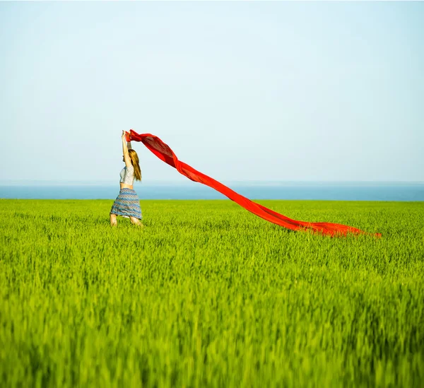 Young happy woman in wheat field with fabric. Summer lifestyle — Stock Photo, Image