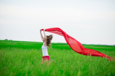 Genç Bayan runing doku yeşil alanı ile. Kadın ve eşarp.