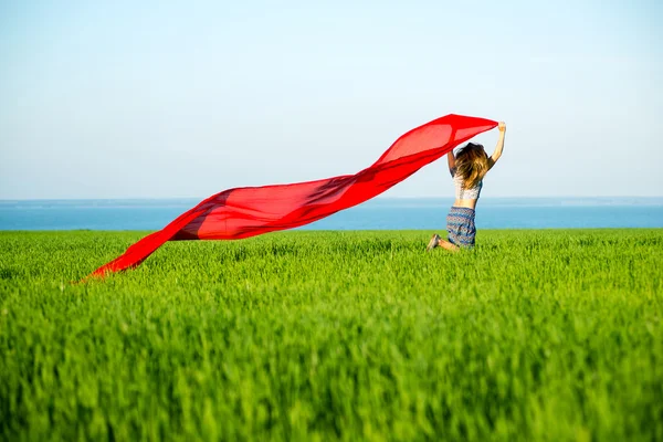 Young happy woman in wheat field with fabric. Summer lifestyle — Stock Photo, Image