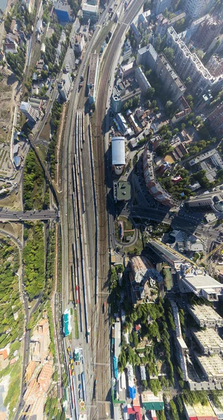 Aerial city view with crossroads, roads, houses, buildings, parks, parking lots — Stock Photo, Image