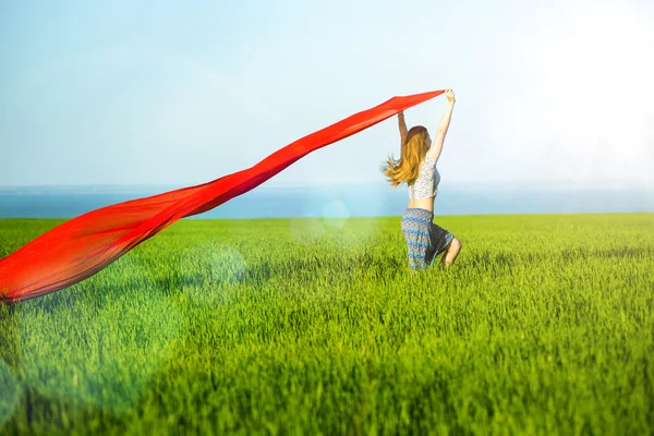 Young happy woman in wheat field with fabric. Summer lifestyle — Stock Photo, Image