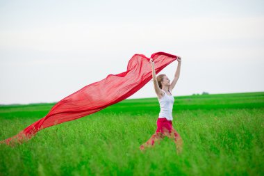 Genç Bayan runing doku yeşil alanı ile. Kadın eşarp ile.