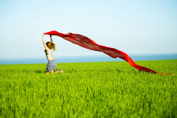 Young happy woman in wheat field with fabric. Summer lifestyle — Stock Photo, Image