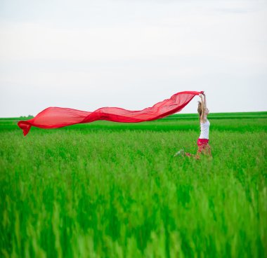 Genç Bayan runing doku yeşil alanı ile. Kadın eşarp ile.