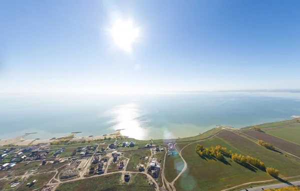 Aerial view of a summer house village at blue sea coast. — Stock Photo, Image