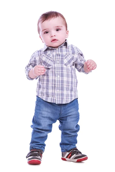 Portret van de kleine jongen in blauwe broek — Stockfoto