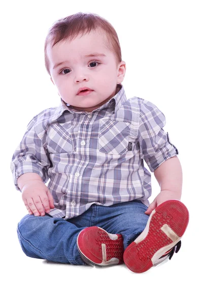 Retrato de menino pequeno em calças azuis — Fotografia de Stock