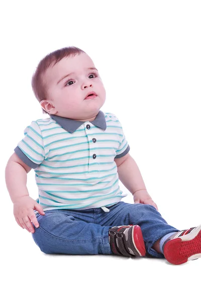 Portrait of small boy in blue trousers — Stock Photo, Image