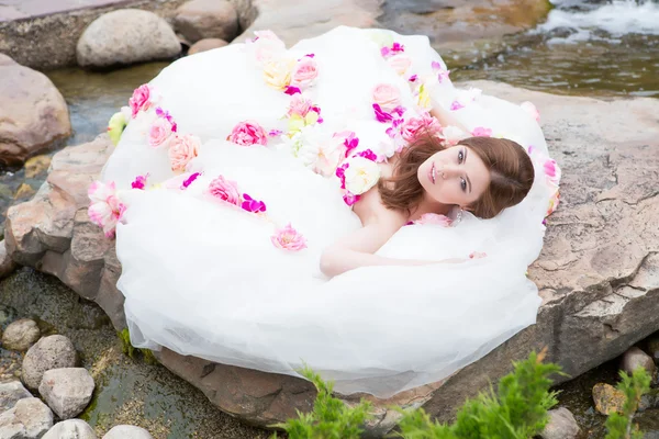 Portrait of a beautiful girl in a white dress — Stock Photo, Image