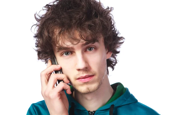 Portret van een knappe man met een mobiele telefoon — Stockfoto